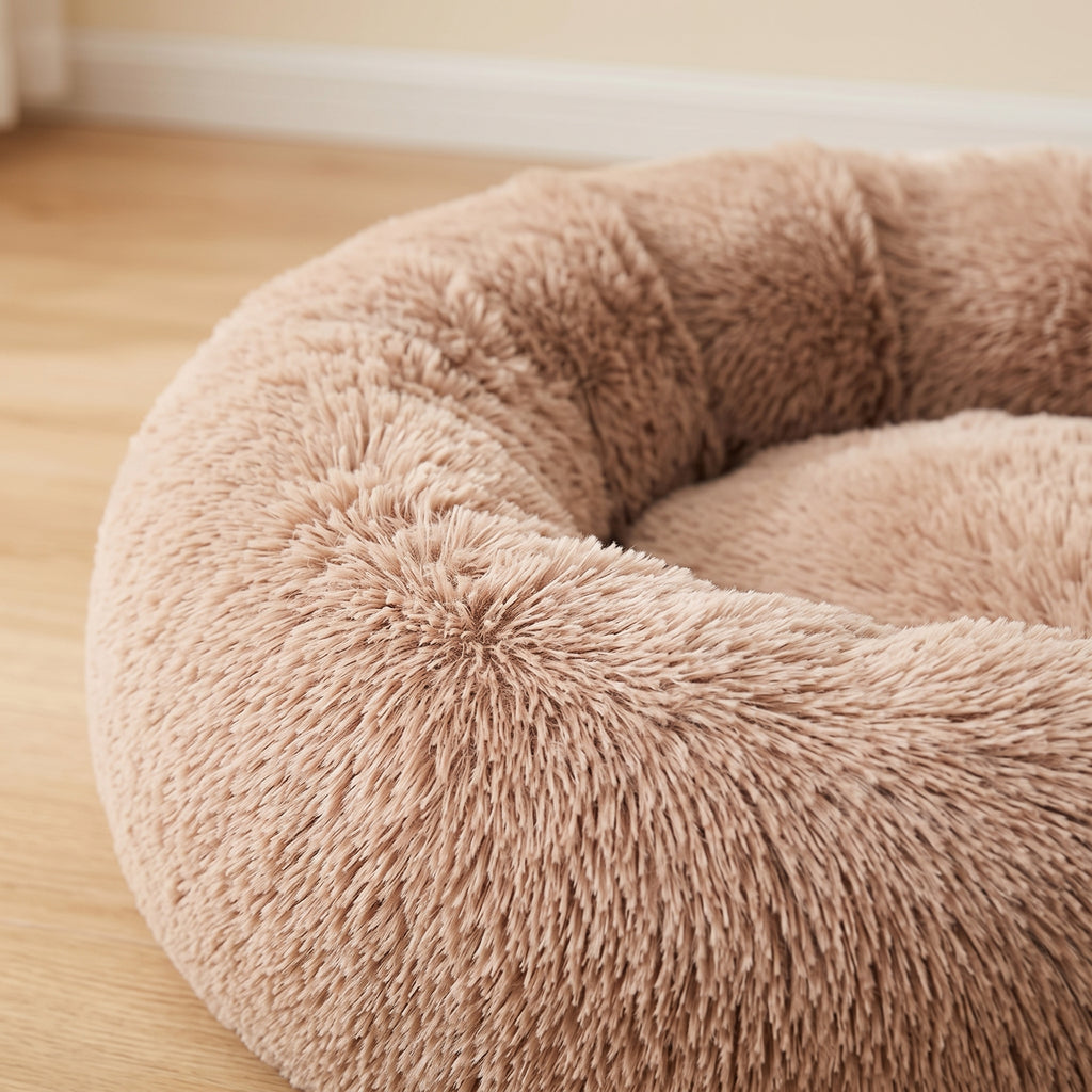 Close-up of the CalmCurl bed raised rim and recessed sleeping well